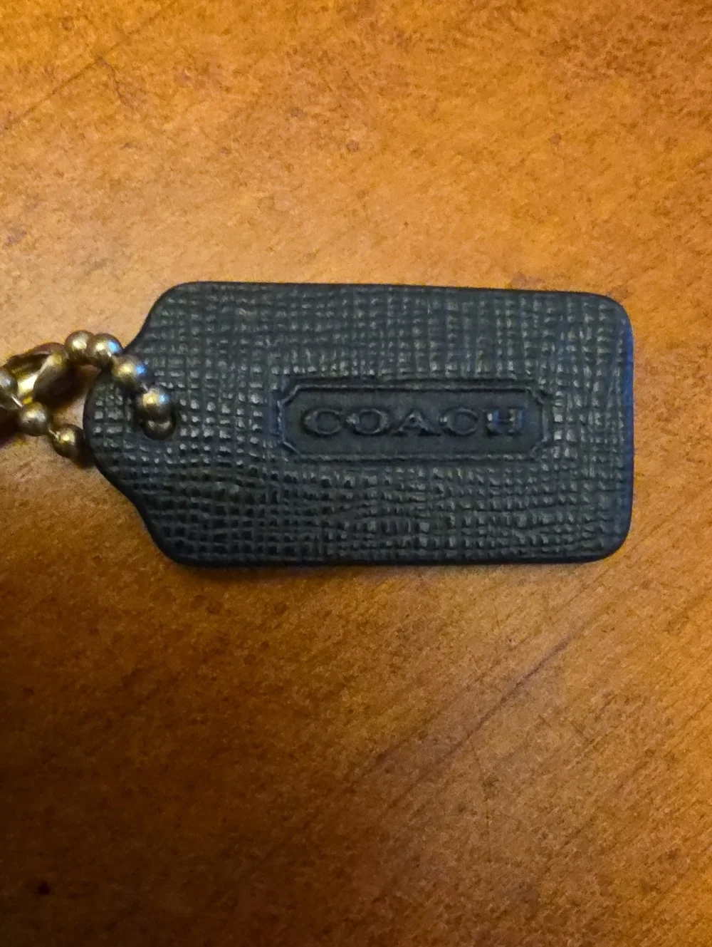 COACH | CORNER ZIP WRISTLET